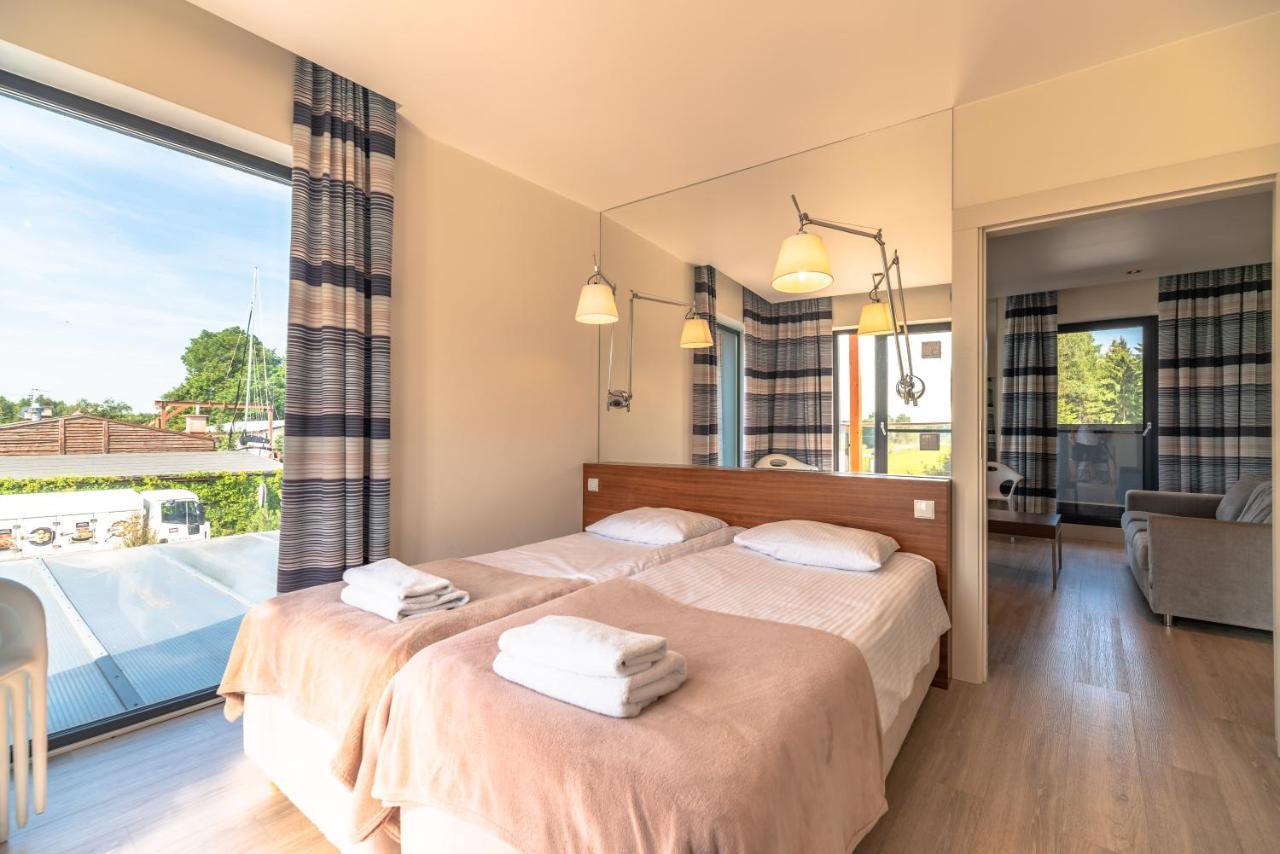 Marina Nawigator Aparthotel Mikołajki Buitenkant foto